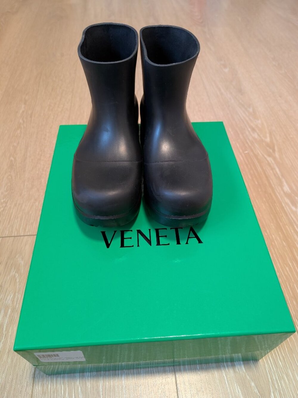 Bottega Veneta Puddle ankle boots in black.